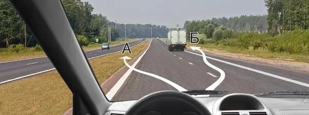 Билет №14, вопрос №5: В каком из указанных мест Вам разрешено пересечь сплошную линию разметки и остановиться?