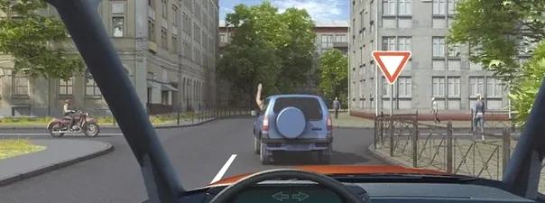 Билет №2, вопрос №7: Поднятая вверх рука водителя легкового автомобиля является сигналом, информирующим Вас о его намерении: